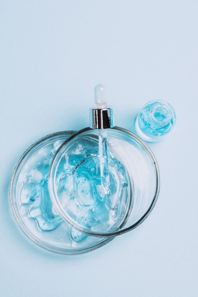 Cosmetics liquid gel serum lubricant hyaluronic acid oxygen bubbles of glass laboratory glassware